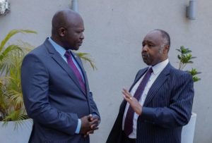 Dr Frank Njenga confers with Janssen Country Manager Mr. Marseile Onyango during the launch of Paliperidone Palmitate for the treatment of schizophrenia.