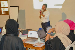Ruth Kaveke during a computer lesson with a section of girls